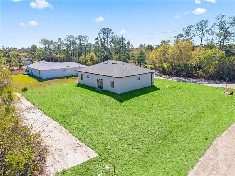 Exterior details and patio area of a home in , Lehigh Acres (Image 13).