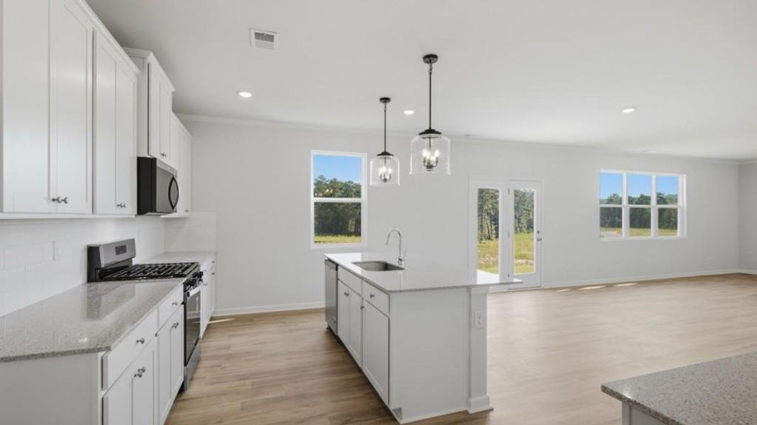 Furnished interior view inside a new home in Fairway 17 at Mirror Lake, Villa Rica (Image 12).