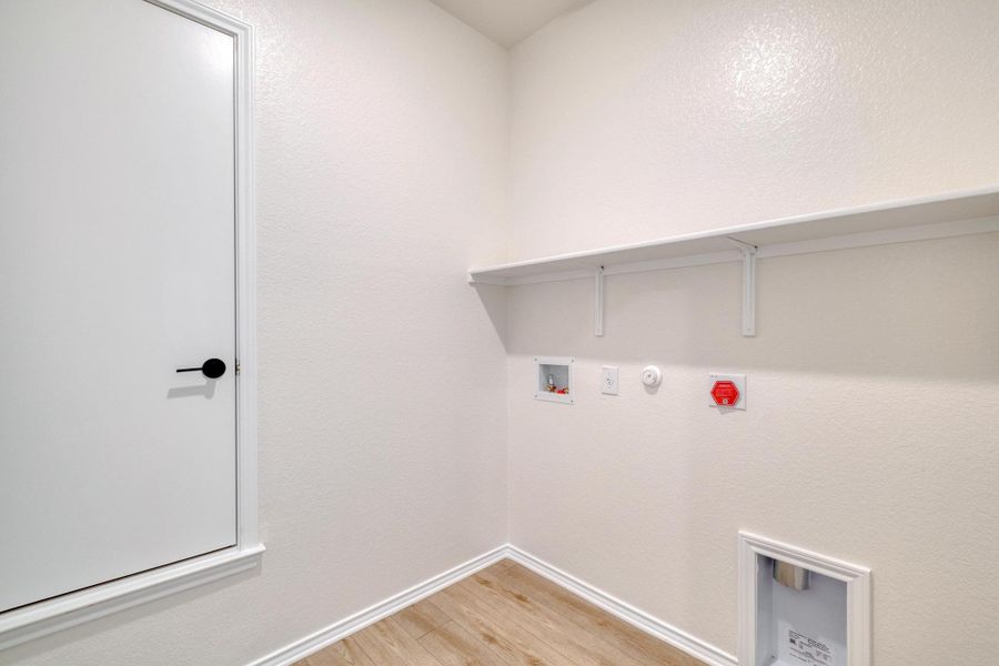 Furnished interior view inside a new home in Mustang Valley, Manor (Image 9).