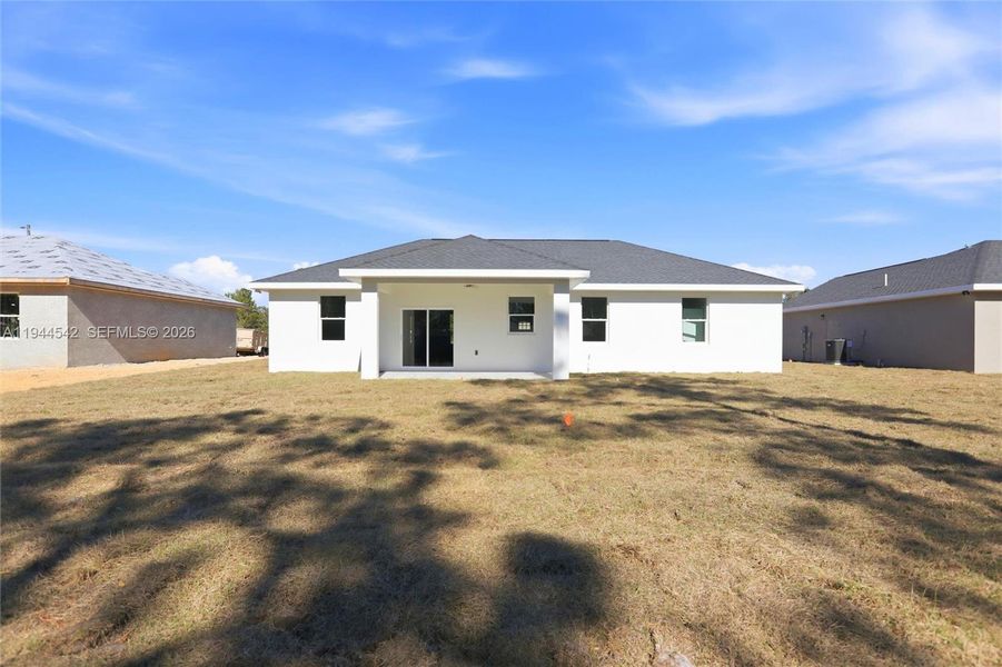 Exterior details and patio area of a home in , Sebring (Image 4).