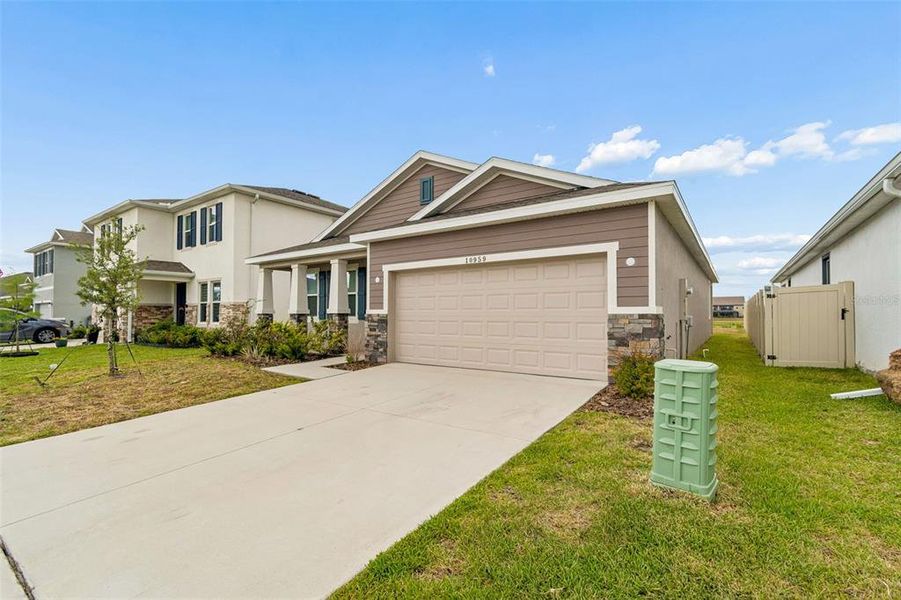 Front exterior of a new home in Mirada, San Antonio, FL, highlighting curb appeal (Image 19).
