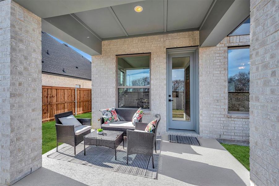 Exterior details and patio area of a home in South Pointe Manor Series, Mansfield (Image 25).