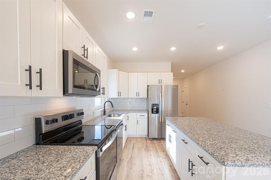 Furnished interior view inside a new home in , Hickory (Image 6).