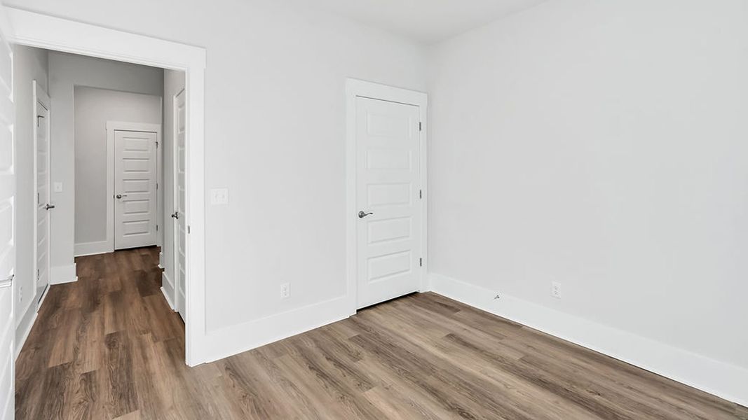 Spacious, unfurnished interior of a new home in The Haven at Indigo Preserve, Leland (Image 23).