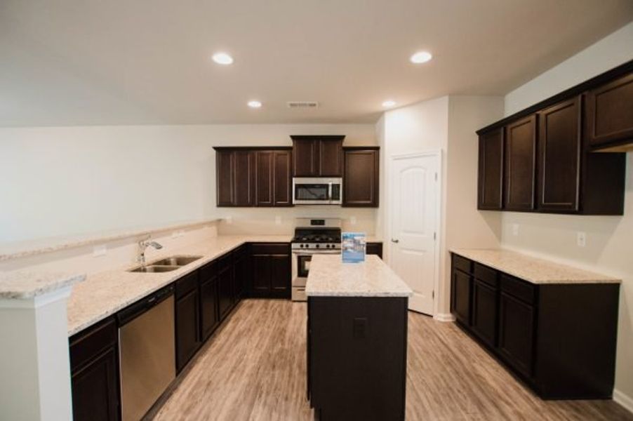 Representative furnished interior of a home built from the Crofton by Piedmont Residential in Hampton Ridge, Jefferson (Image 4).