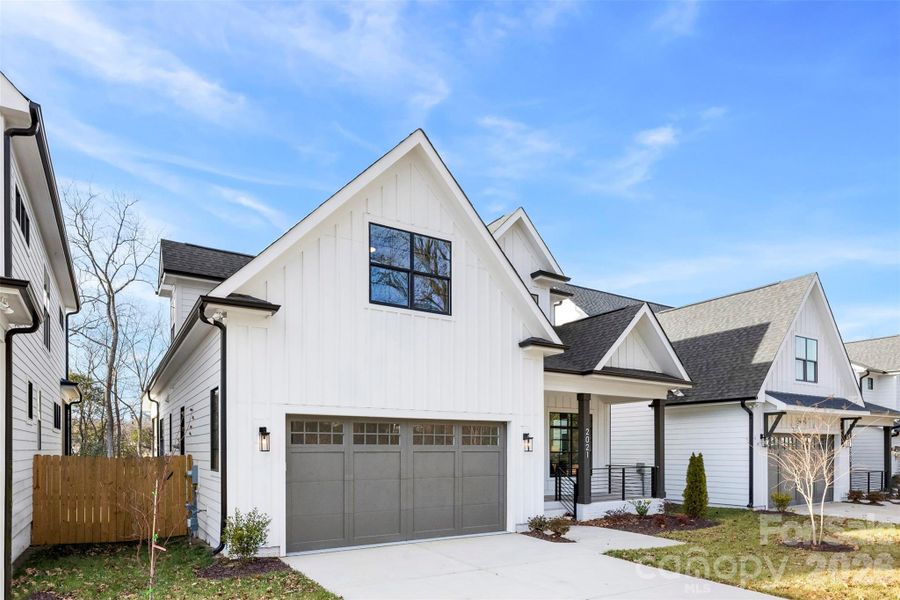 Front exterior of a new home in , Charlotte, NC, highlighting curb appeal (Image 25).