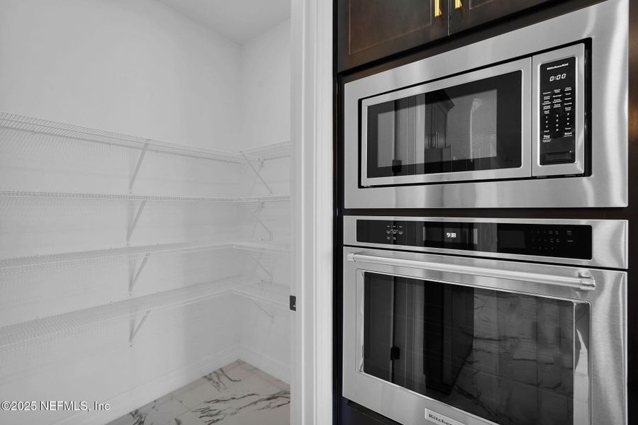 Furnished interior view inside a new home in Summer Bay at Grand Oaks, St. Augustine (Image 3). Furnished interior view inside a new home in Summer Bay at Grand Oaks, St. Augustine (Image 3).