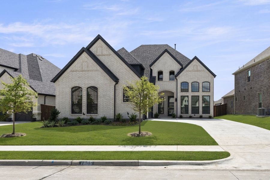 Representative exterior photo of a completed home built from the Sutton by Windsor Homes in Nelson Lake Estates, Rockwall, TX (Image 2).