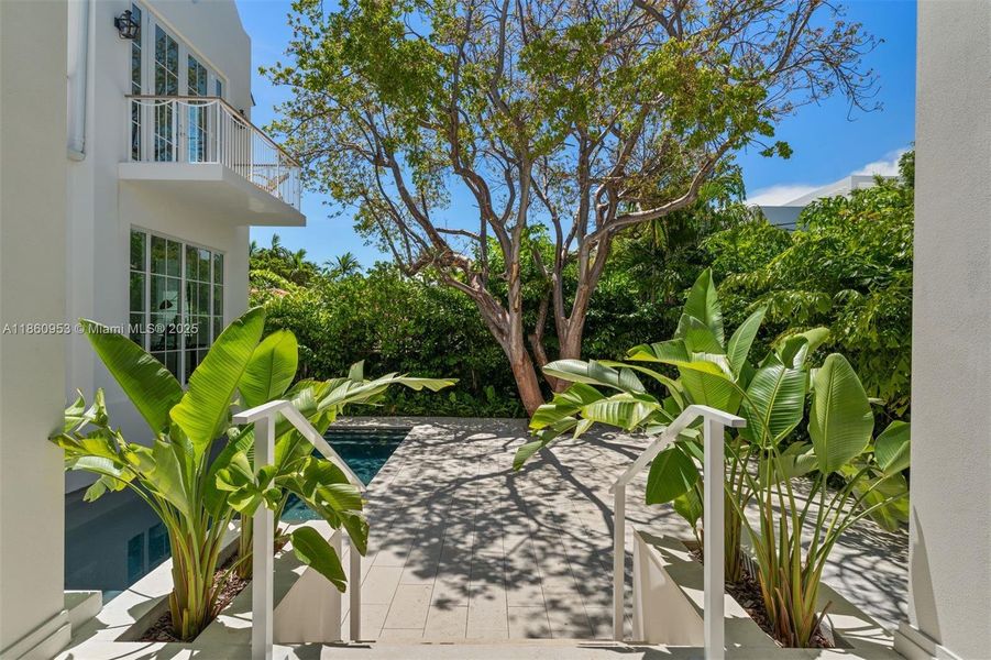 Front exterior of a new home in , Key Biscayne, FL, highlighting curb appeal (Image 24). Front exterior of a new home in , Key Biscayne, FL, highlighting curb appeal (Image 24).