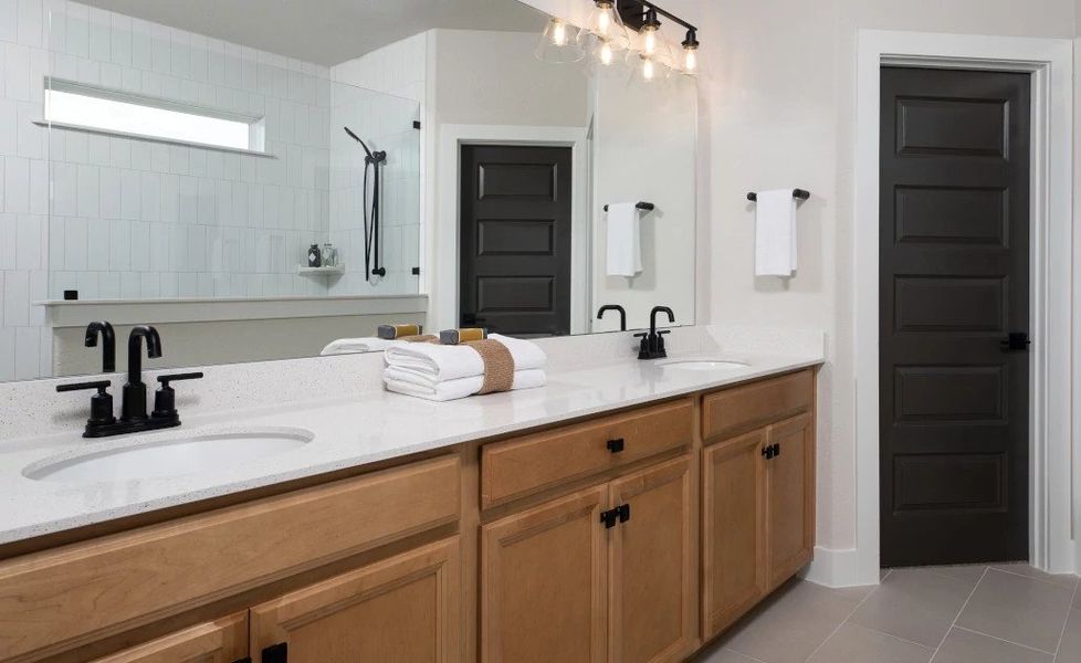 Representative furnished interior of a home built from the Blue Jay by Ashton Woods in Lariat, Liberty Hill (Image 11).