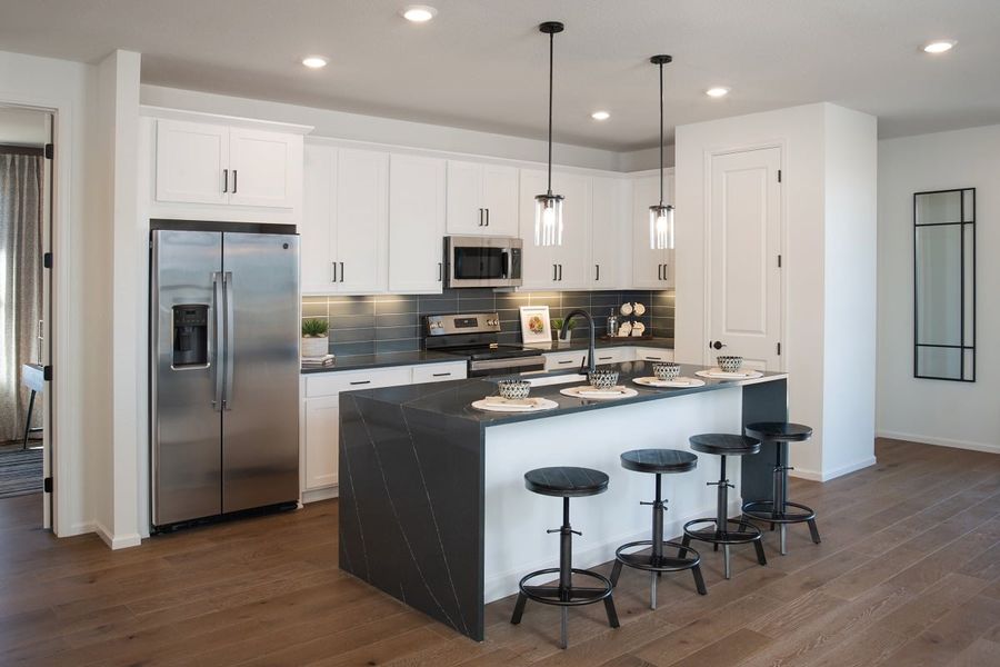 Representative furnished interior of a home built from the 1887 by KB Home in Legato, Commerce City (Image 3).