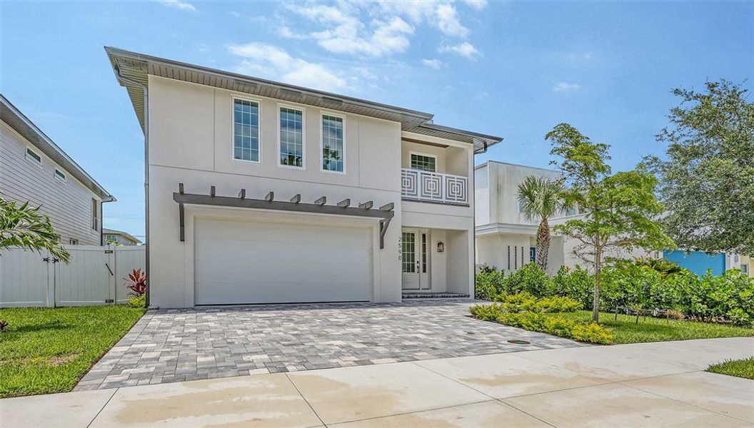 Front exterior of a new home in , Sarasota, FL, highlighting curb appeal (Image 25). Front exterior of a new home in , Sarasota, FL, highlighting curb appeal (Image 25).
