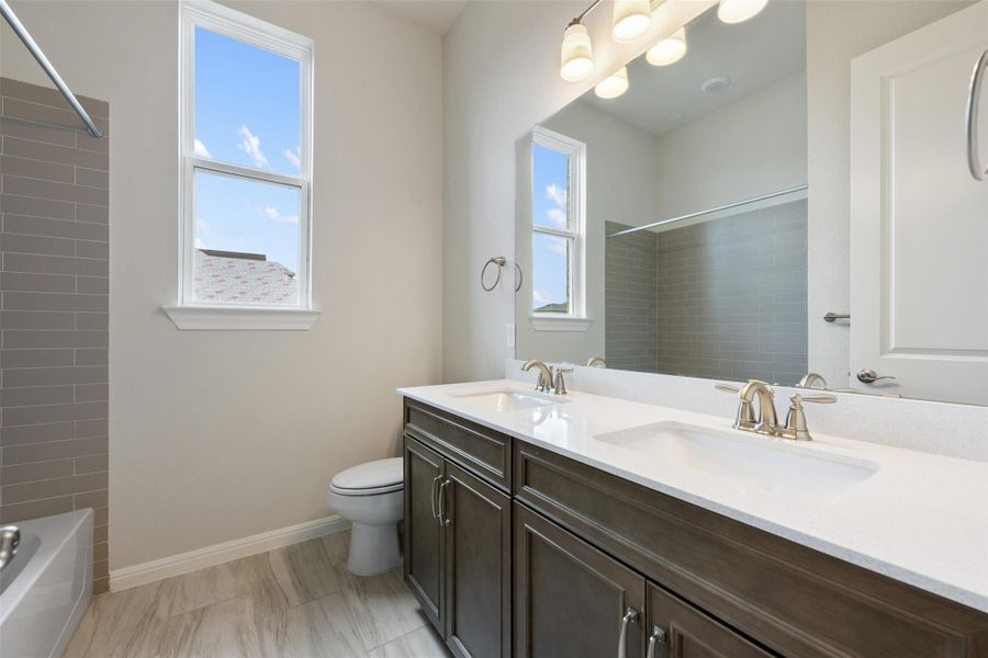 Furnished interior view inside a new home in The Trails at Carmel, Pflugerville (Image 16).