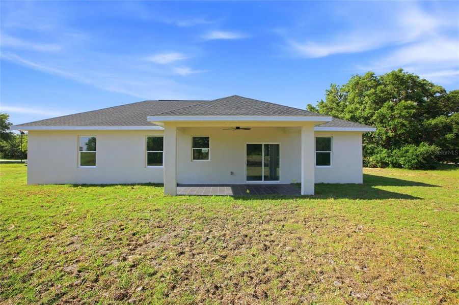 Exterior details and patio area of a home in , Sebring (Image 4).