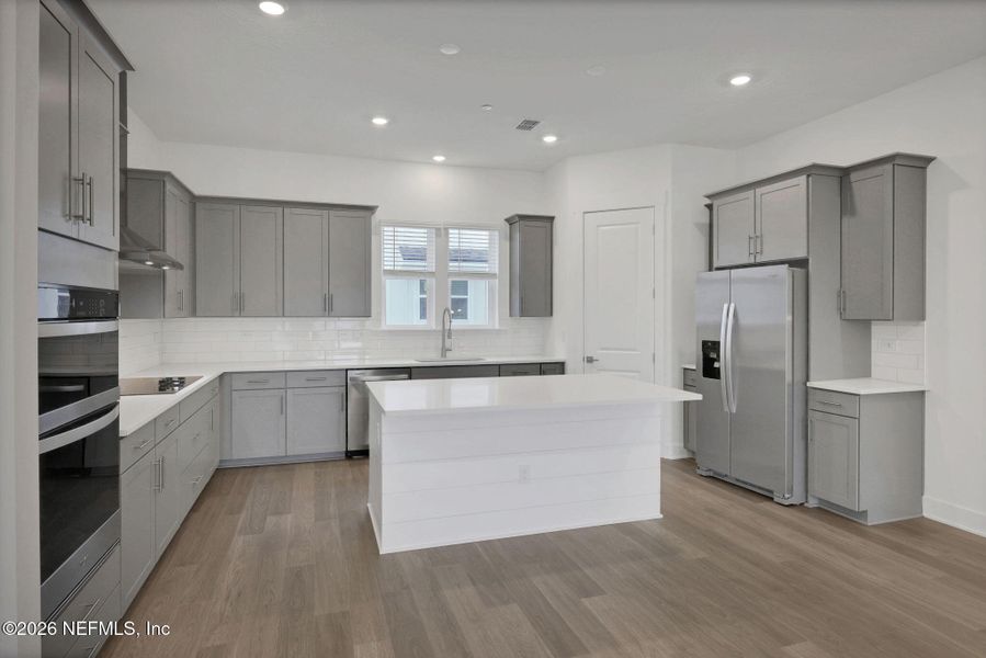 Furnished interior view inside a new home in North Beach Townhomes, Jacksonville Beach (Image 15).