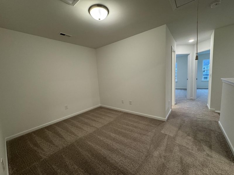 Spacious, unfurnished interior of a new home in East Main Townes, Spartanburg (Image 13).