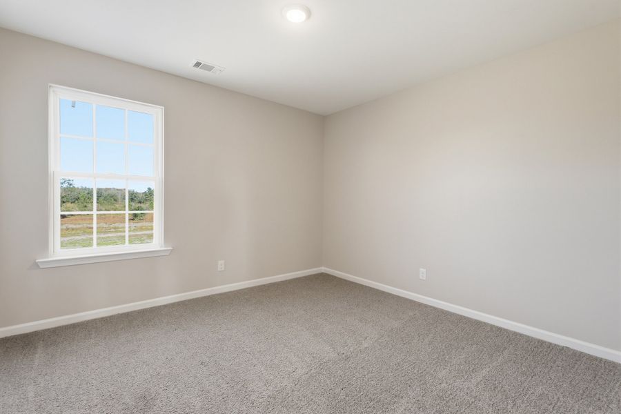 Representative unfurnished interior of a home built from the The Screven by RTS Homes in Tibet Road at Sassafras, Allenhurst (Image 39).