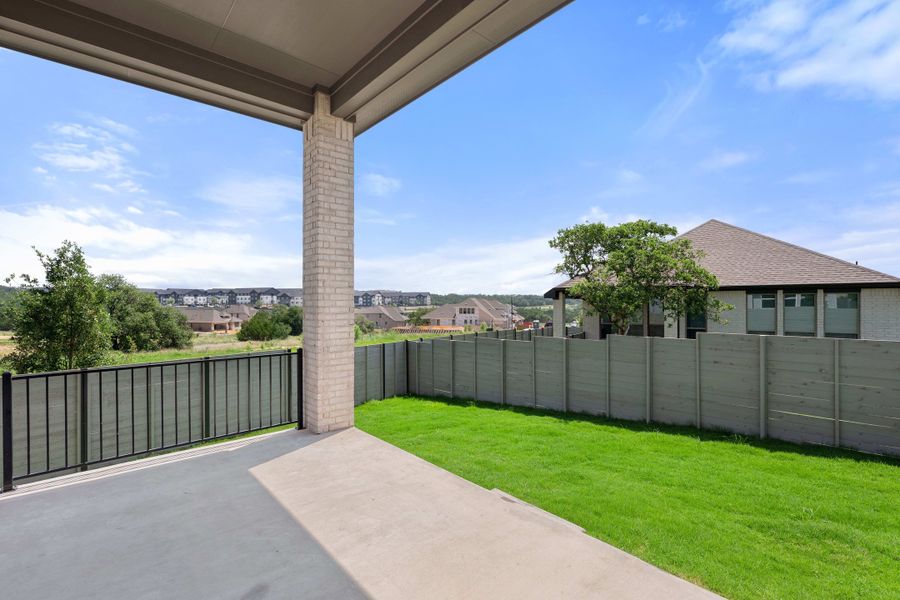 Exterior details and patio area of a home in Wolf Ranch, Georgetown (Image 34).