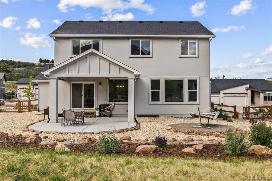 Front exterior of a new home in , Monument, CO, highlighting curb appeal (Image 19).