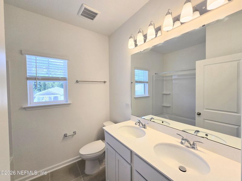 Furnished interior view inside a new home in Hyland Trail, Green Cove Springs (Image 14).