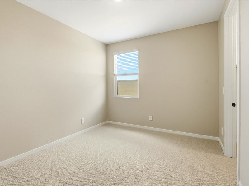Spacious, unfurnished interior of a new home in Blossom Rock Signature Series, Apache Junction (Image 17).