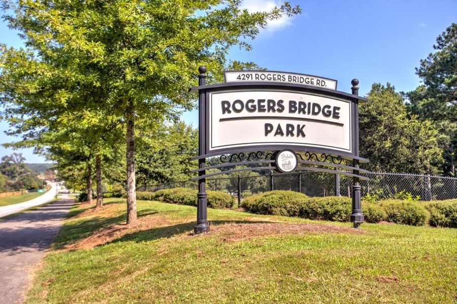 Front exterior of a new home in Riversong, Duluth, GA, highlighting curb appeal (Image 23).