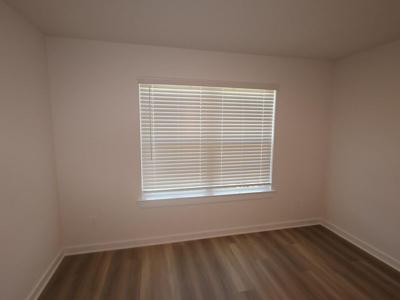 Spacious, unfurnished interior of a new home in Pinewood at Grand Texas, New Caney (Image 13).