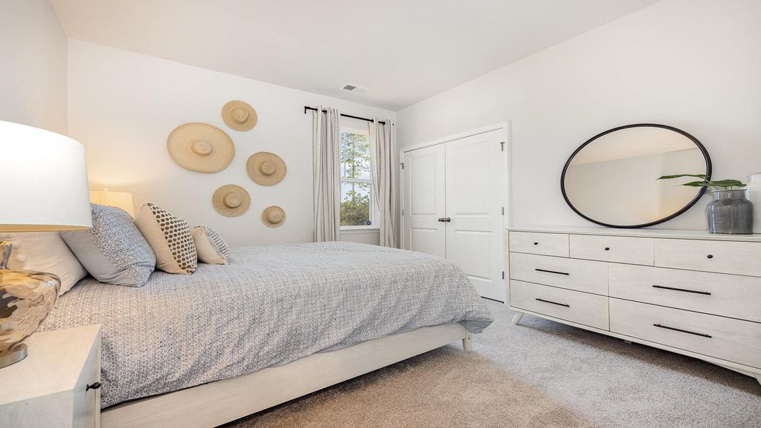 Furnished interior view inside a new home in Pine Hills at Cane Bay, Summerville (Image 7).