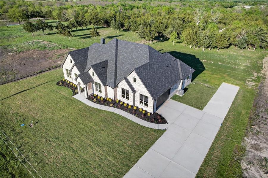 Front exterior of a new home in , Celeste, TX, highlighting curb appeal (Image 26).