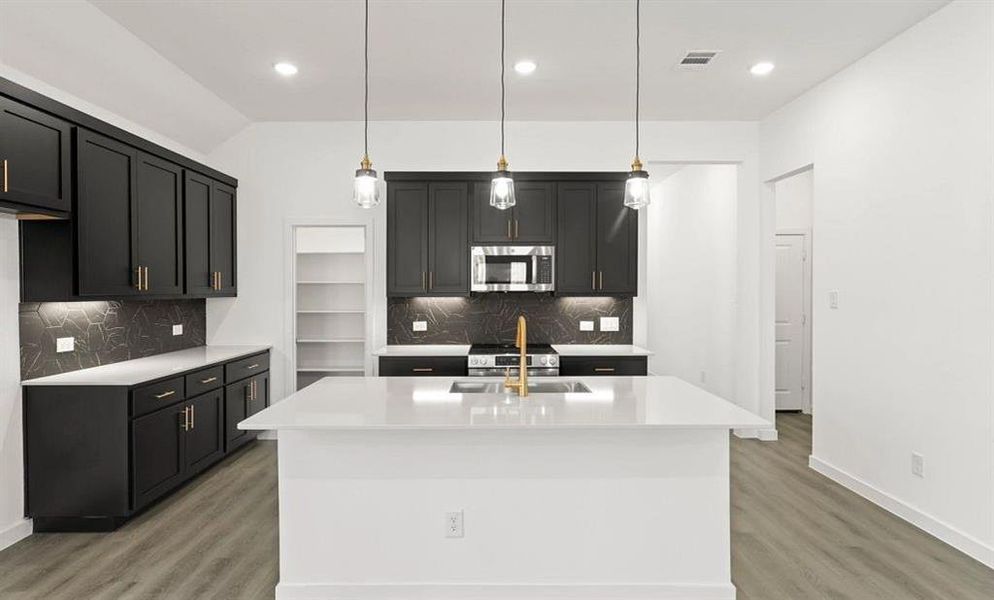 Kitchen featuring the Noir Collection