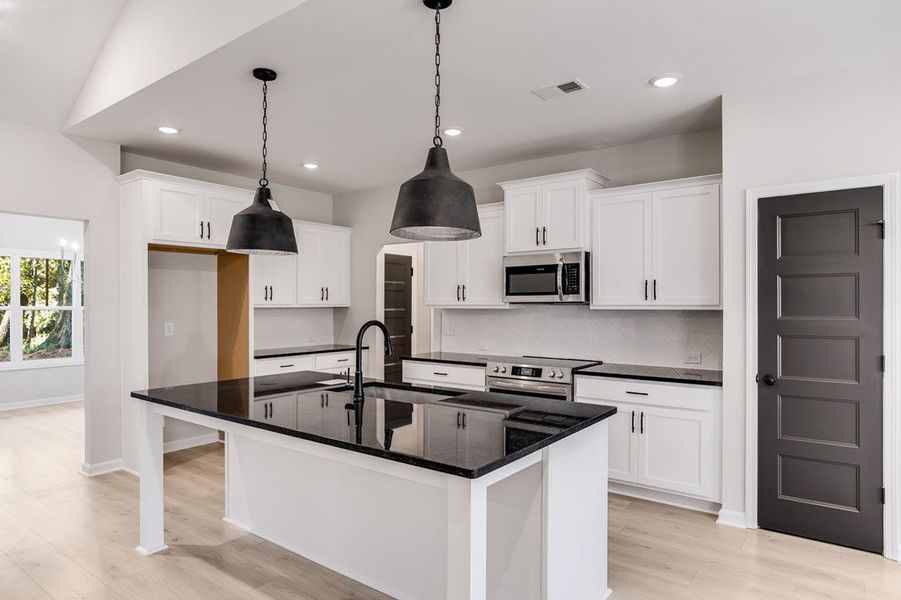Furnished interior view inside a new home in LOVVORN ESTATES, Carrollton (Image 13).