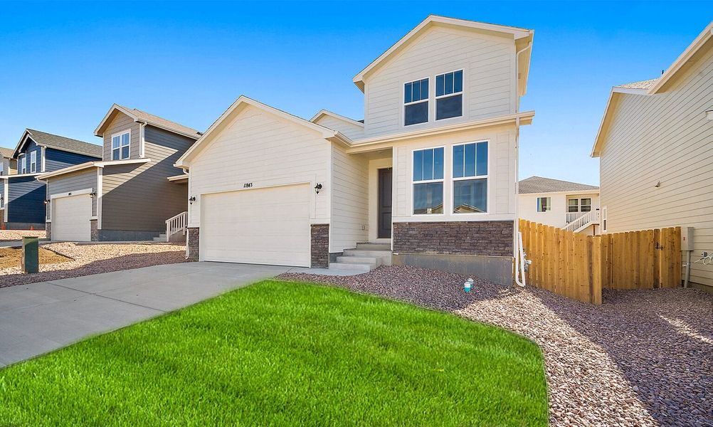 Exterior details and patio area of a home in Ridge at Lorson Ranch, Colorado Springs (Image 4).