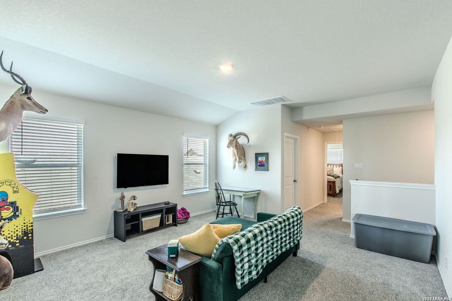 Furnished interior view inside a new home in The Links at River Bend, Floresville (Image 25).