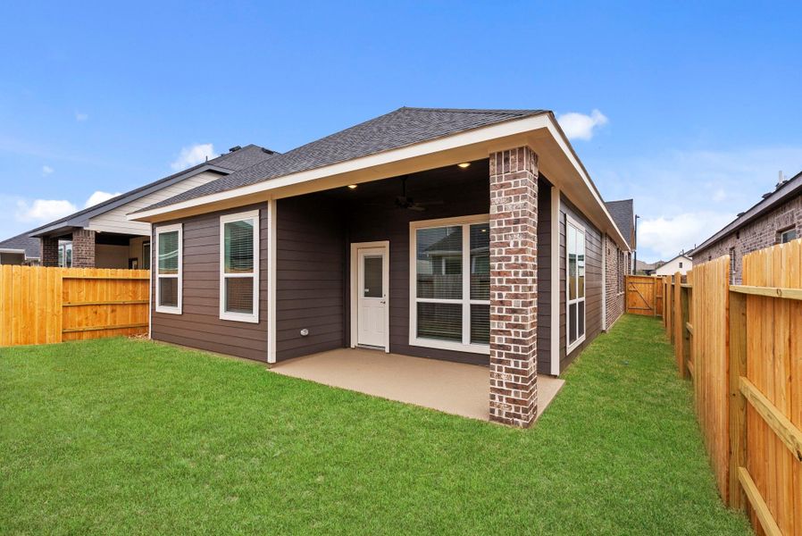 Exterior details and patio area of a home in Emory Glen, Magnolia (Image 3). Exterior details and patio area of a home in Emory Glen, Magnolia (Image 3).