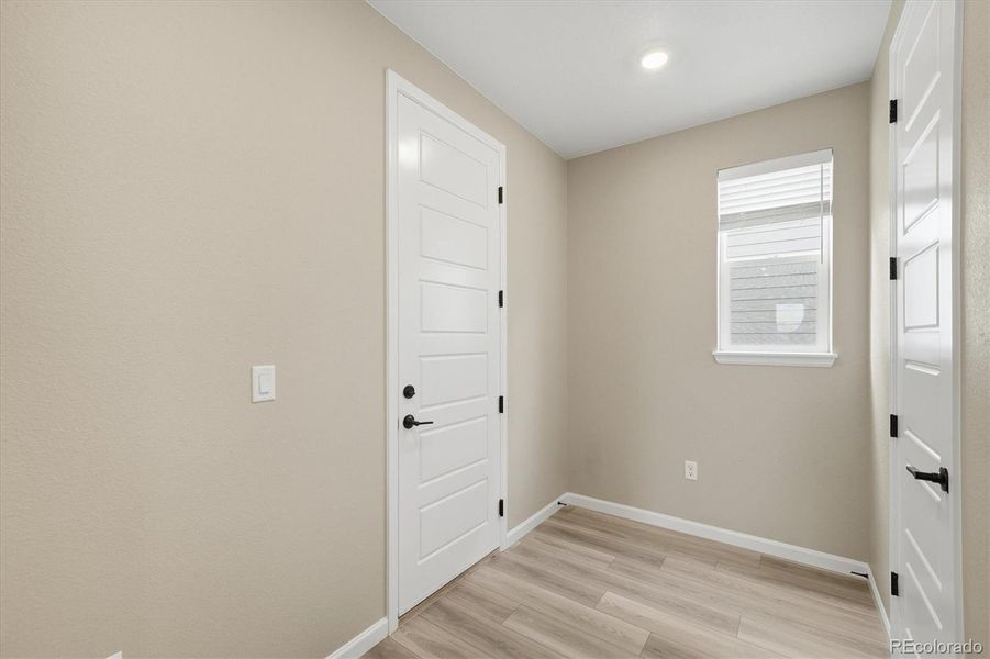 Mud area when you enter through the garage door, as well as an extra coat closet.