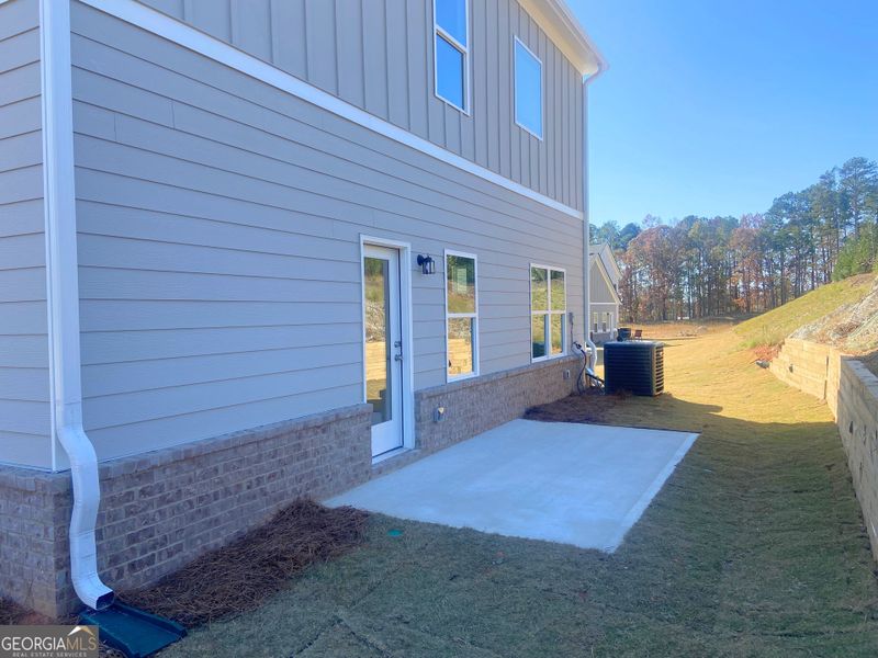 Exterior details and patio area of a home in Trellis Park, Hampton (Image 3). Exterior details and patio area of a home in Trellis Park, Hampton (Image 3).