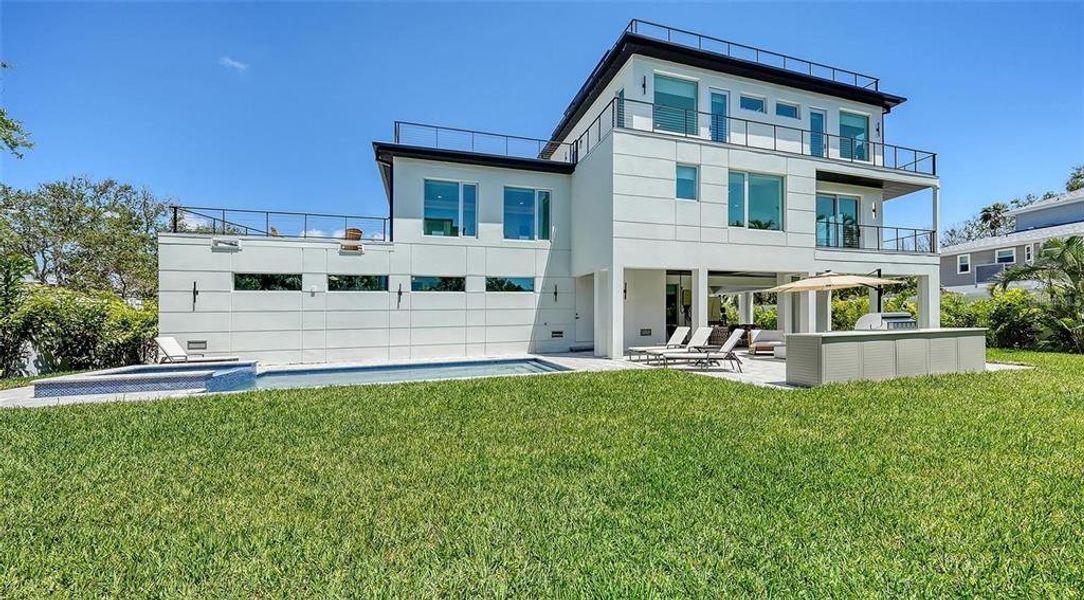 Exterior details and patio area of a home in , Sarasota (Image 21).