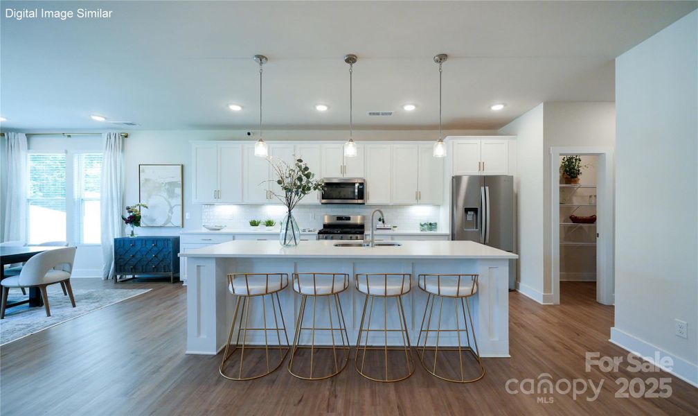 Digital Image Similar - Kitchen with bar seating at the island