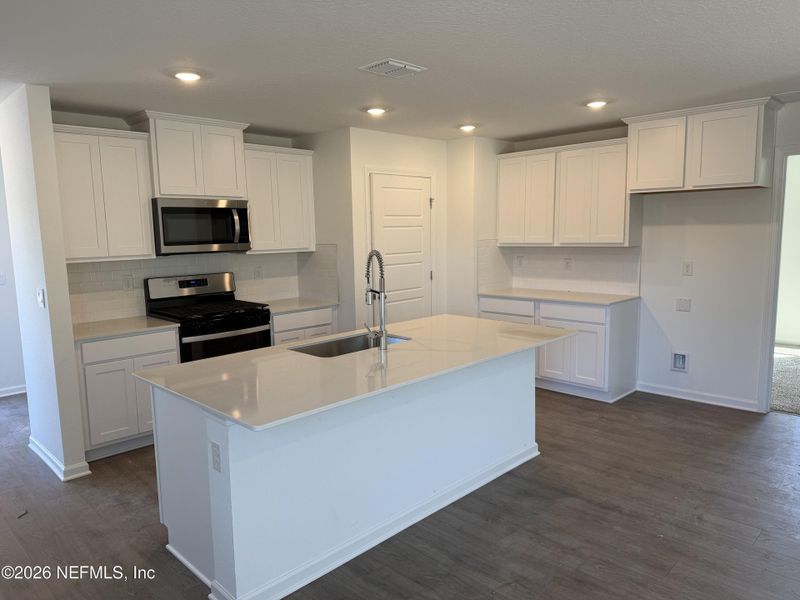 Furnished interior view inside a new home in Grand Reserve, Bunnell (Image 7). Furnished interior view inside a new home in Grand Reserve, Bunnell (Image 7).