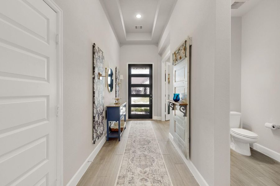 Furnished interior view inside a new home in Meridiana 55', Manvel (Image 17). Furnished interior view inside a new home in Meridiana 55', Manvel (Image 17).