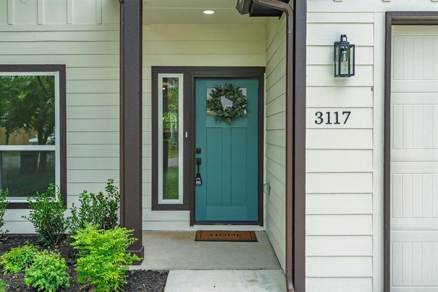 Front exterior of a new home in , Greenville, TX, highlighting curb appeal (Image 23). Front exterior of a new home in , Greenville, TX, highlighting curb appeal (Image 23).