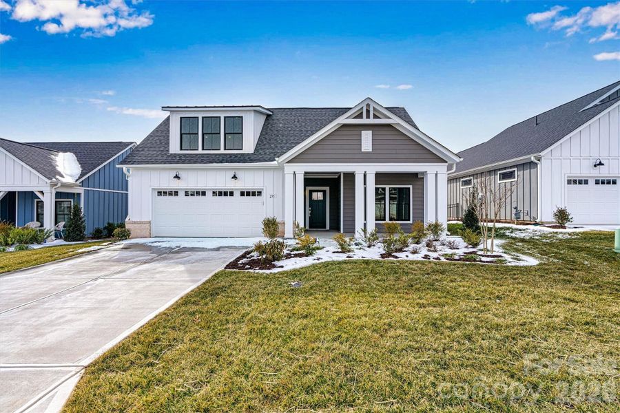 Front exterior of a new home in The Courtyards at Lake Davidson, Mooresville, NC, highlighting curb appeal (Image 26).
