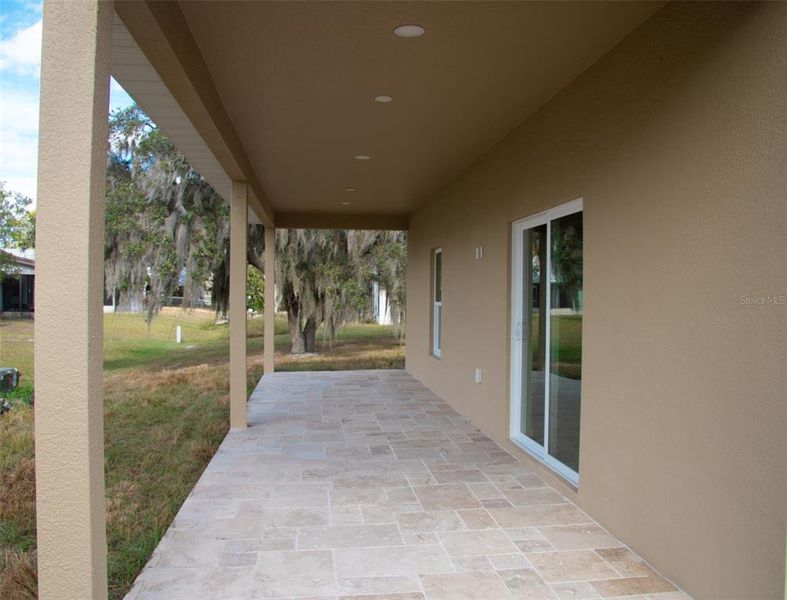 Exterior details and patio area of a home in , Sebring (Image 3).