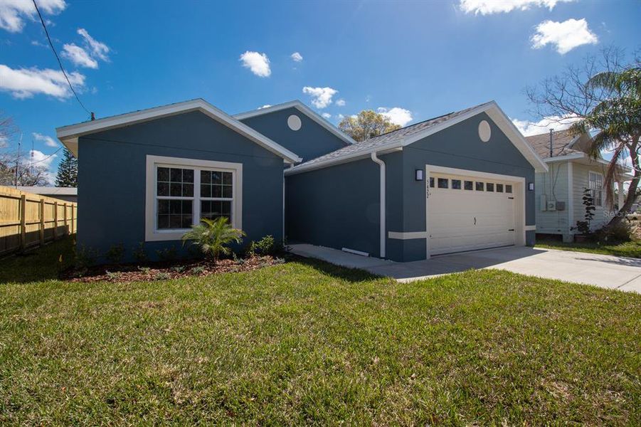 Front exterior of a new home in , New Port Richey, FL, highlighting curb appeal (Image 16).