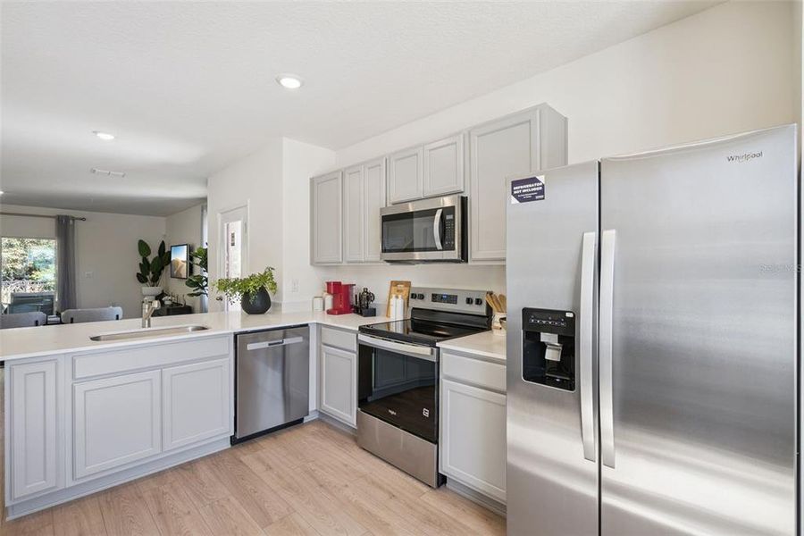 Furnished interior view inside a new home in Oak Pointe, Apopka (Image 6).