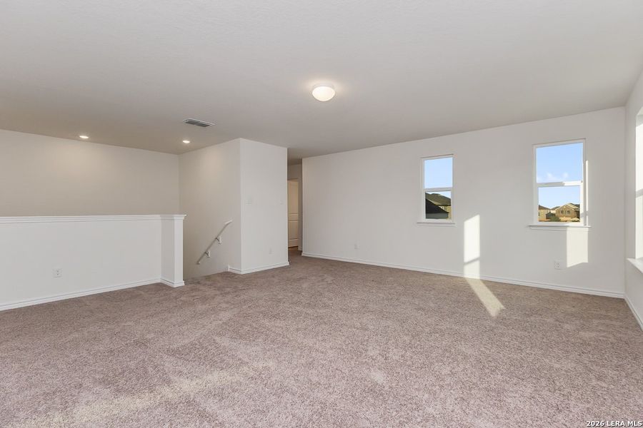 Spacious, unfurnished interior of a new home in Preserve at Culebra - Classic Collection, San Antonio (Image 11).