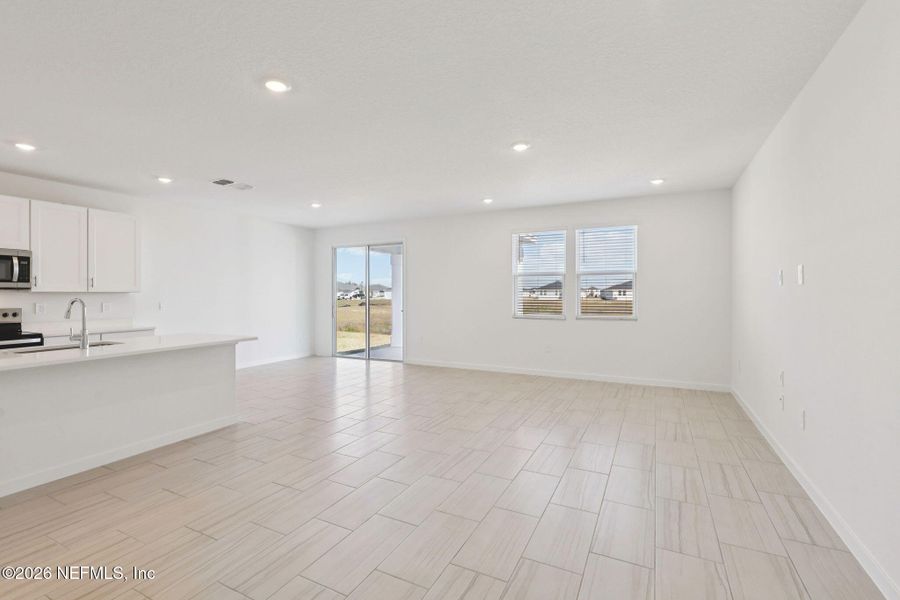 Spacious, unfurnished interior of a new home in Lakes at Bella Lago - Signature Series, Green Cove Springs (Image 35).