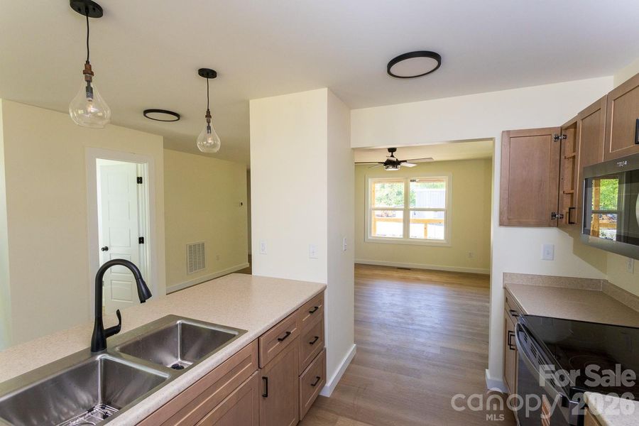 Large Open Kitchen w Stainless Steel Fridge, Dishwasher, Oven/stove Disposal