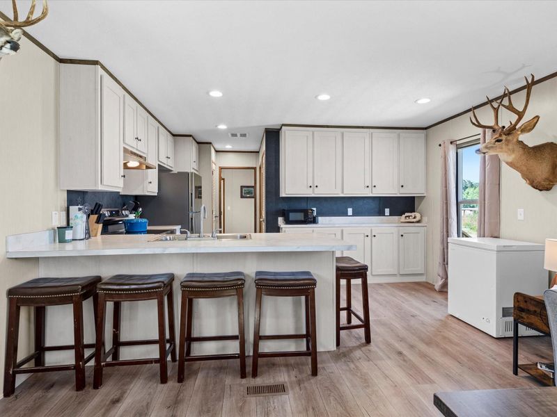 Furnished interior view inside a new home in , La Vernia (Image 3).