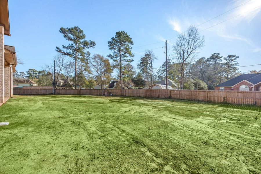 Exterior details and patio area of a home in , Magnolia (Image 31). Exterior details and patio area of a home in , Magnolia (Image 31).